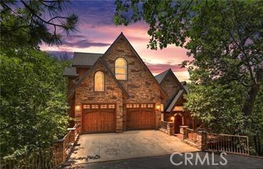 1019 Pintail Cir, Lake Arrowhead, CA 92352 - view of front of house featuring concrete driveway and a garage