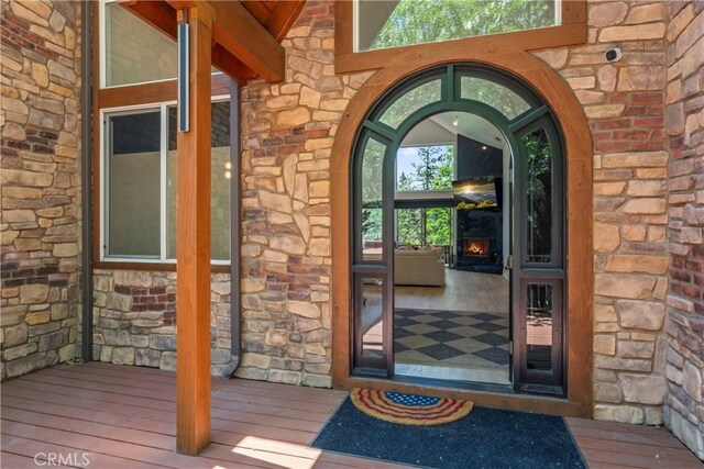 1019 Pintail Cir, Lake Arrowhead, CA 92352 - doorway to property with stone siding and brick siding