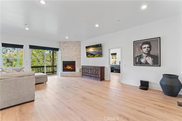 1019 Pintail Cir, Lake Arrowhead, CA 92352 - living room featuring light wood finished floors, healthy amount of natural light, recessed lighting, and a fireplace
