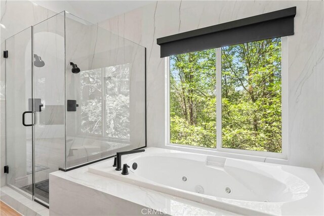 1019 Pintail Cir, Lake Arrowhead, CA 92352 - bathroom featuring healthy amount of natural light and a marble finish shower