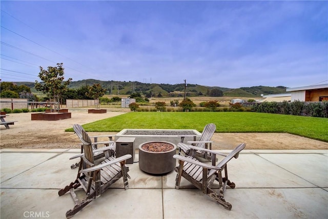2289 Falcon Ridge Ln, Los Osos, CA 93402 - view of patio / terrace with a fire pit and a mountain view