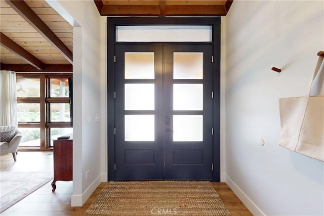 2289 Falcon Ridge Ln, Los Osos, CA 93402 - foyer with light wood-style floors and a wooden ceiling with exposed beams