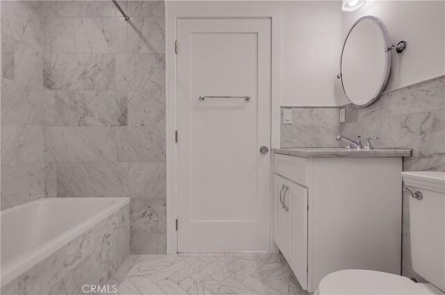 3803 Berryman Ave, Los Angeles, CA 90066 - bathroom featuring toilet, vanity, tile walls, and marble finish flooring