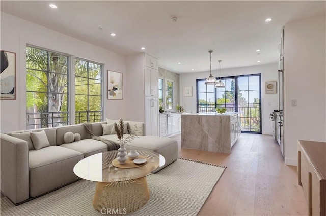 3803 Berryman Ave, Los Angeles, CA 90066 - living area with light wood-type flooring, recessed lighting, and baseboards