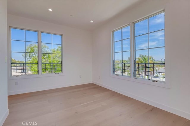 3803 Berryman Ave, Los Angeles, CA 90066 - spare room featuring plenty of natural light, baseboards, light wood-type flooring, and recessed lighting