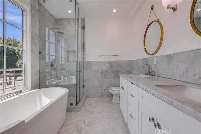 3803 Berryman Ave, Los Angeles, CA 90066 - full bath featuring tile walls, a freestanding bath, double vanity, a shower stall, and wainscoting