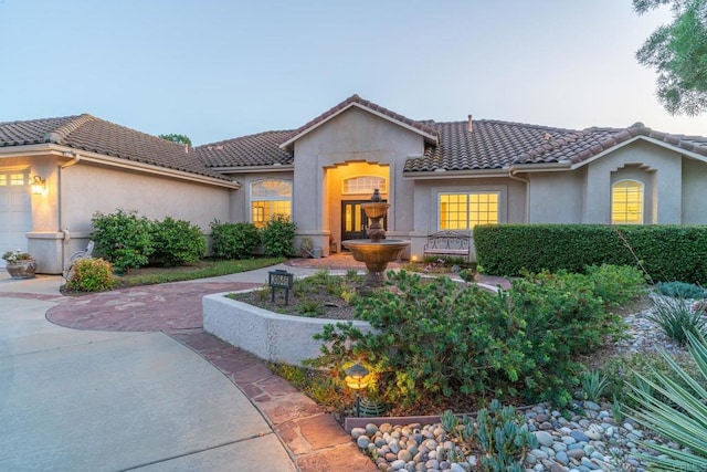 30646 Red Hawk Rd, Valley Center, CA 92082 - mediterranean / spanish-style home featuring a tiled roof, stucco siding, and a garage
