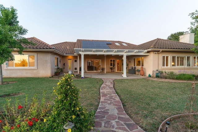 30646 Red Hawk Rd, Valley Center, CA 92082 - back of property featuring roof mounted solar panels, a tile roof, and stucco siding