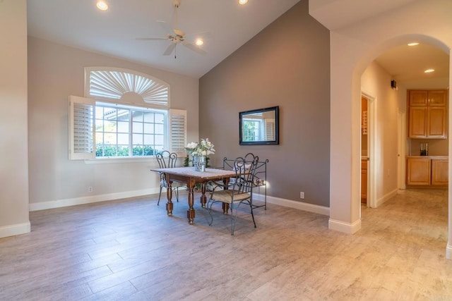 30646 Red Hawk Rd, Valley Center, CA 92082 - dining area with arched walkways, ceiling fan, light wood finished floors, recessed lighting, and high vaulted ceiling
