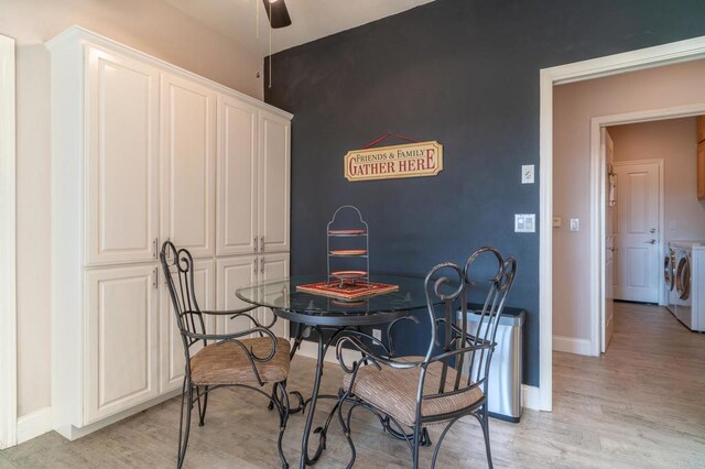 30646 Red Hawk Rd, Valley Center, CA 92082 - dining area featuring separate washer and dryer, a ceiling fan, and light wood-type flooring