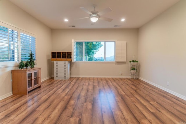 30646 Red Hawk Rd, Valley Center, CA 92082 - empty room with healthy amount of natural light, wood finished floors, a ceiling fan, and recessed lighting