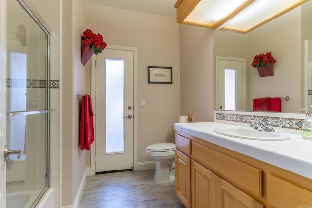 30646 Red Hawk Rd, Valley Center, CA 92082 - full bathroom featuring healthy amount of natural light, vanity, wood finished floors, and shower / bath combination with glass door