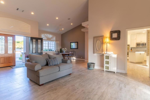 30646 Red Hawk Rd, Valley Center, CA 92082 - living room featuring high vaulted ceiling, recessed lighting, and light wood-style floors