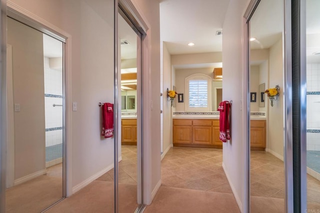 30646 Red Hawk Rd, Valley Center, CA 92082 - hallway featuring light tile patterned flooring and recessed lighting