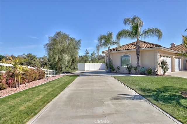 41380 La Sierra Rd, Temecula, CA 92591 - mediterranean / spanish-style home with a tile roof, stucco siding, a garage, and driveway