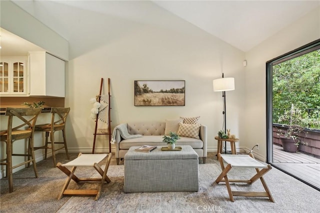 2787 Pine Creek Cir, Fullerton, CA 92835 - living area featuring lofted ceiling, carpet floors, and baseboards