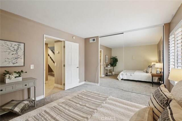 2787 Pine Creek Cir, Fullerton, CA 92835 - bedroom featuring light colored carpet, a closet, and baseboards