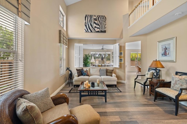 11964 Ashley Pl, San Diego, CA 92128 - living area featuring plenty of natural light, wood finished floors, and a high ceiling