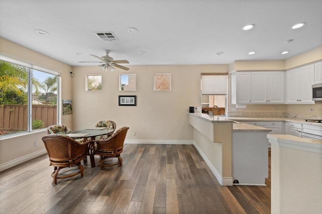 11964 Ashley Pl, San Diego, CA 92128 - dining area with dark wood-style floors, a ceiling fan, and recessed lighting