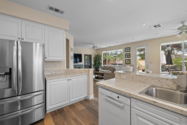 11964 Ashley Pl, San Diego, CA 92128 - kitchen with stainless steel refrigerator with ice dispenser, white dishwasher, ceiling fan, dark wood-type flooring, and white cabinets