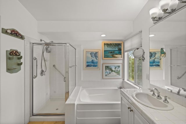 11964 Ashley Pl, San Diego, CA 92128 - full bathroom featuring a garden tub, a stall shower, vanity, and recessed lighting