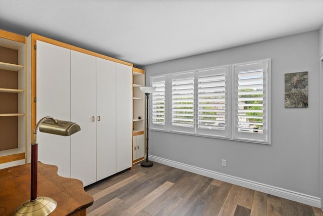 11964 Ashley Pl, San Diego, CA 92128 - unfurnished bedroom with wood finished floors and a closet