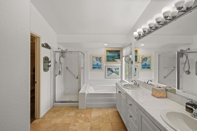 11964 Ashley Pl, San Diego, CA 92128 - full bathroom featuring a stall shower, double vanity, a bath, a spacious closet, and recessed lighting