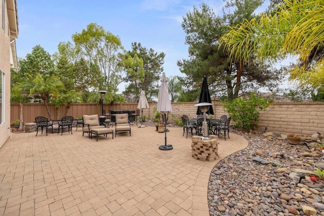 11964 Ashley Pl, San Diego, CA 92128 - fenced backyard with outdoor dining area and a patio area