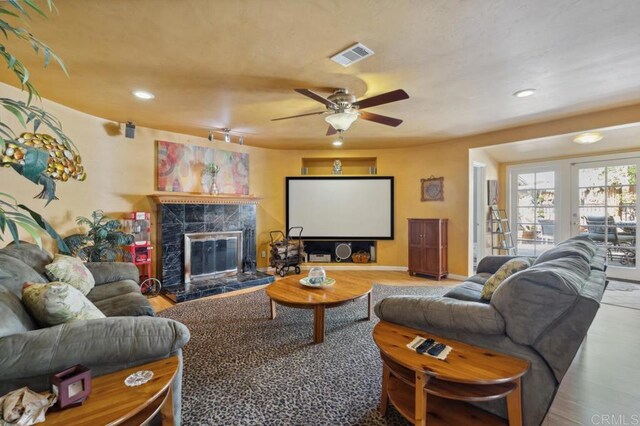10880 Hess Dr, La Mesa, CA 91941 - living room with wood finished floors, a ceiling fan, a fireplace, recessed lighting, and baseboards