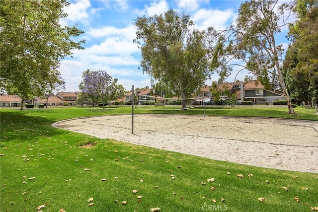 77 S Havenwood Unit 27, Irvine, CA 92614 - surrounding community with volleyball court, a residential view, and a lawn