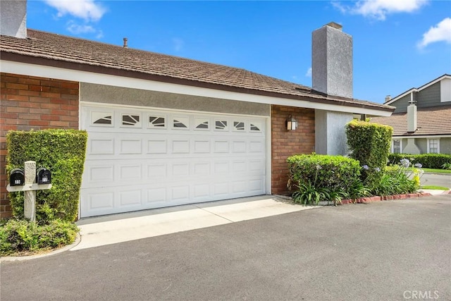 77 S Havenwood Unit 27, Irvine, CA 92614 - garage featuring concrete driveway
