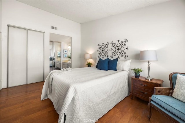 77 S Havenwood Unit 27, Irvine, CA 92614 - bedroom with hardwood / wood-style flooring and a closet