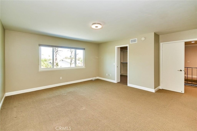2108 Via Caliente, Fullerton, CA 92833 - unfurnished bedroom with carpet floors, baseboards, a spacious closet, and a closet