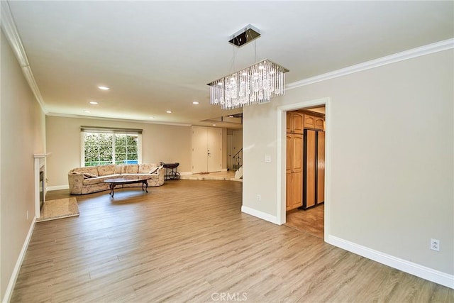 2108 Via Caliente, Fullerton, CA 92833 - living room featuring ornamental molding, light wood-type flooring, baseboards, and recessed lighting