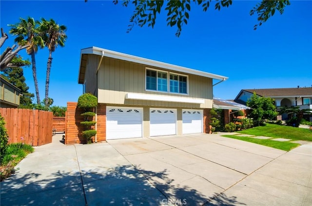 2108 Via Caliente, Fullerton, CA 92833 - view of front of house featuring driveway and an attached garage