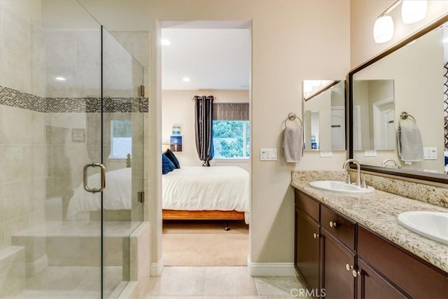 1055 Ford Dr, Nipomo, CA 93444 - ensuite bathroom featuring double vanity, a stall shower, and tile patterned floors