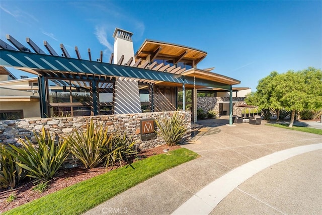 1055 Ford Dr, Nipomo, CA 93444 - contemporary home featuring a chimney and a patio area