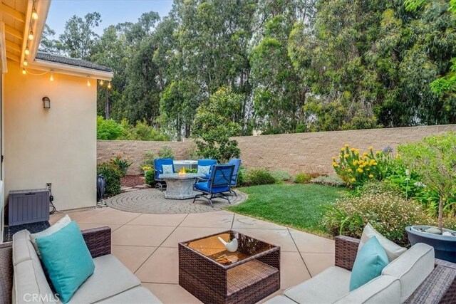 1055 Ford Dr, Nipomo, CA 93444 - fenced backyard featuring an outdoor living space with a fire pit and a patio