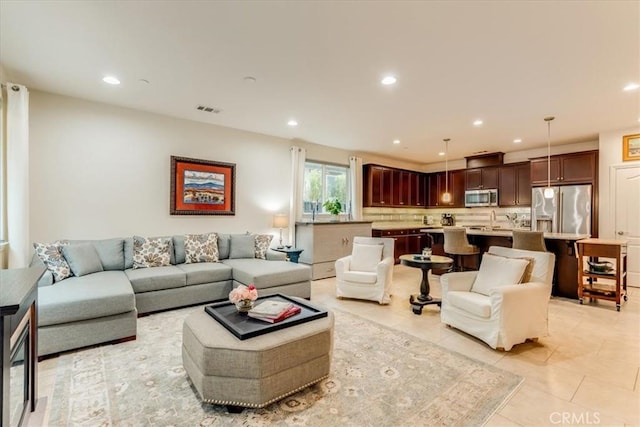 1055 Ford Dr, Nipomo, CA 93444 - living room with recessed lighting and light tile patterned floors