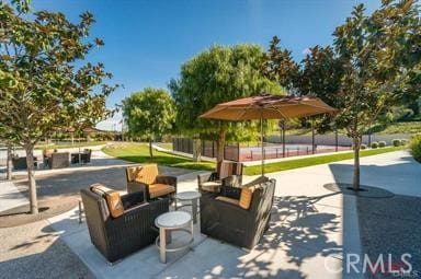1055 Ford Dr, Nipomo, CA 93444 - surrounding community featuring an outdoor living space and a patio