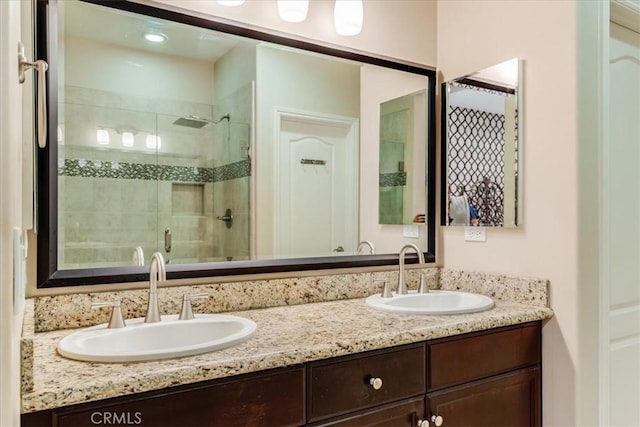 1055 Ford Dr, Nipomo, CA 93444 - bathroom with a stall shower and double vanity