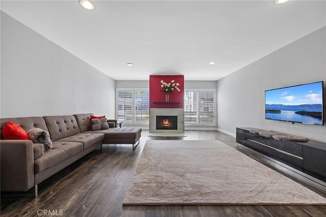 14506 Benefit St Unit 103, Sherman Oaks, CA 91403 - living area with a fireplace with flush hearth, baseboards, wood finished floors, and recessed lighting