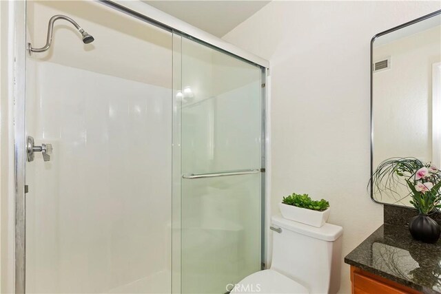 7605 Pasito Ave, Rancho Cucamonga, CA 91730 - full bathroom featuring a shower with door, vanity, and toilet