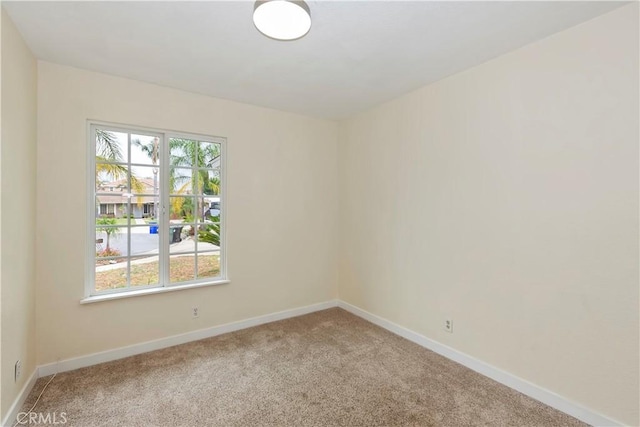 7605 Pasito Ave, Rancho Cucamonga, CA 91730 - empty room featuring light colored carpet and baseboards
