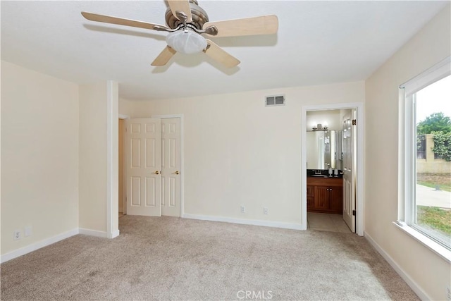 7605 Pasito Ave, Rancho Cucamonga, CA 91730 - spare room with light colored carpet, a ceiling fan, and baseboards
