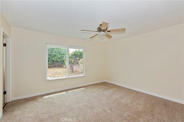 7605 Pasito Ave, Rancho Cucamonga, CA 91730 - spare room featuring carpet flooring, a ceiling fan, and baseboards