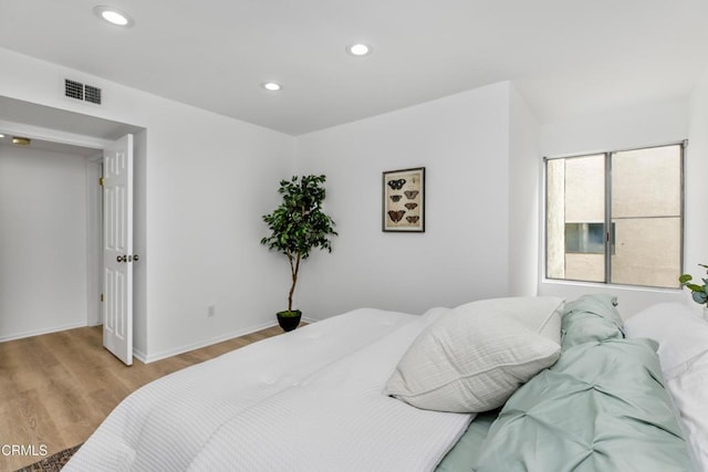 5354 Lindley Ave Unit 202, Encino, CA 91316 - bedroom featuring recessed lighting, light wood-style floors, and baseboards