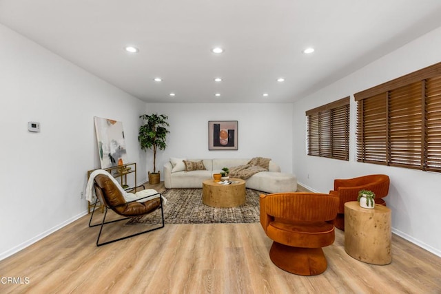 5354 Lindley Ave Unit 202, Encino, CA 91316 - living room with light wood finished floors, recessed lighting, and baseboards