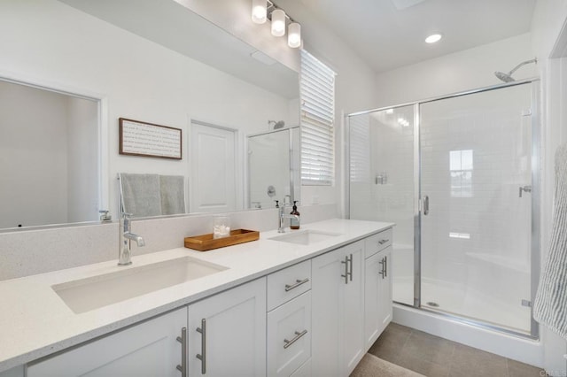 2328 Stardust Gln, Escondido, CA 92025 - full bath featuring a stall shower, double vanity, and tile patterned flooring