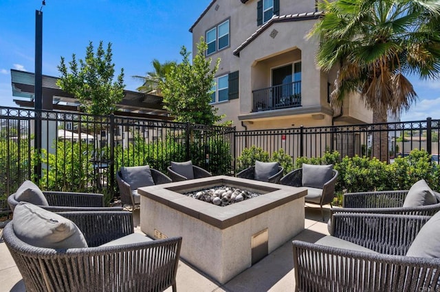 2328 Stardust Gln, Escondido, CA 92025 - view of patio with an outdoor living space with a fire pit